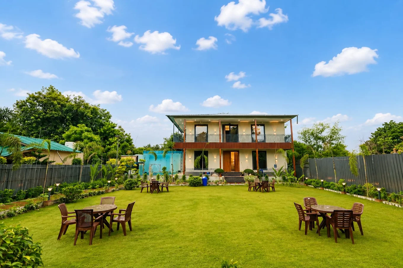 Wide lawn and villa at GP Royal Farm Noida