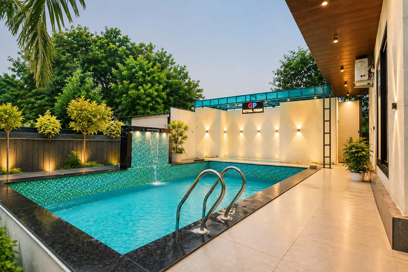 Illuminated private pool in the evening